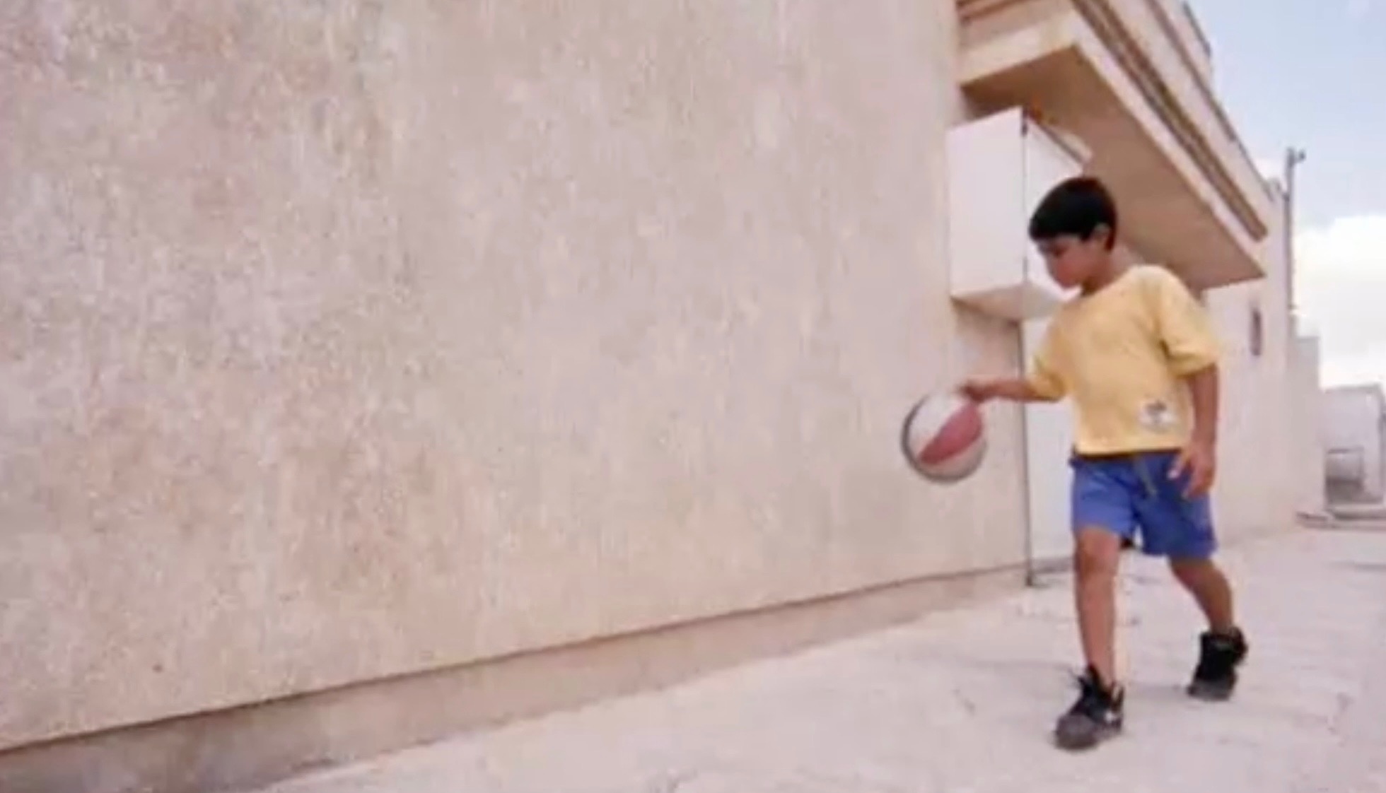 boy playing in street