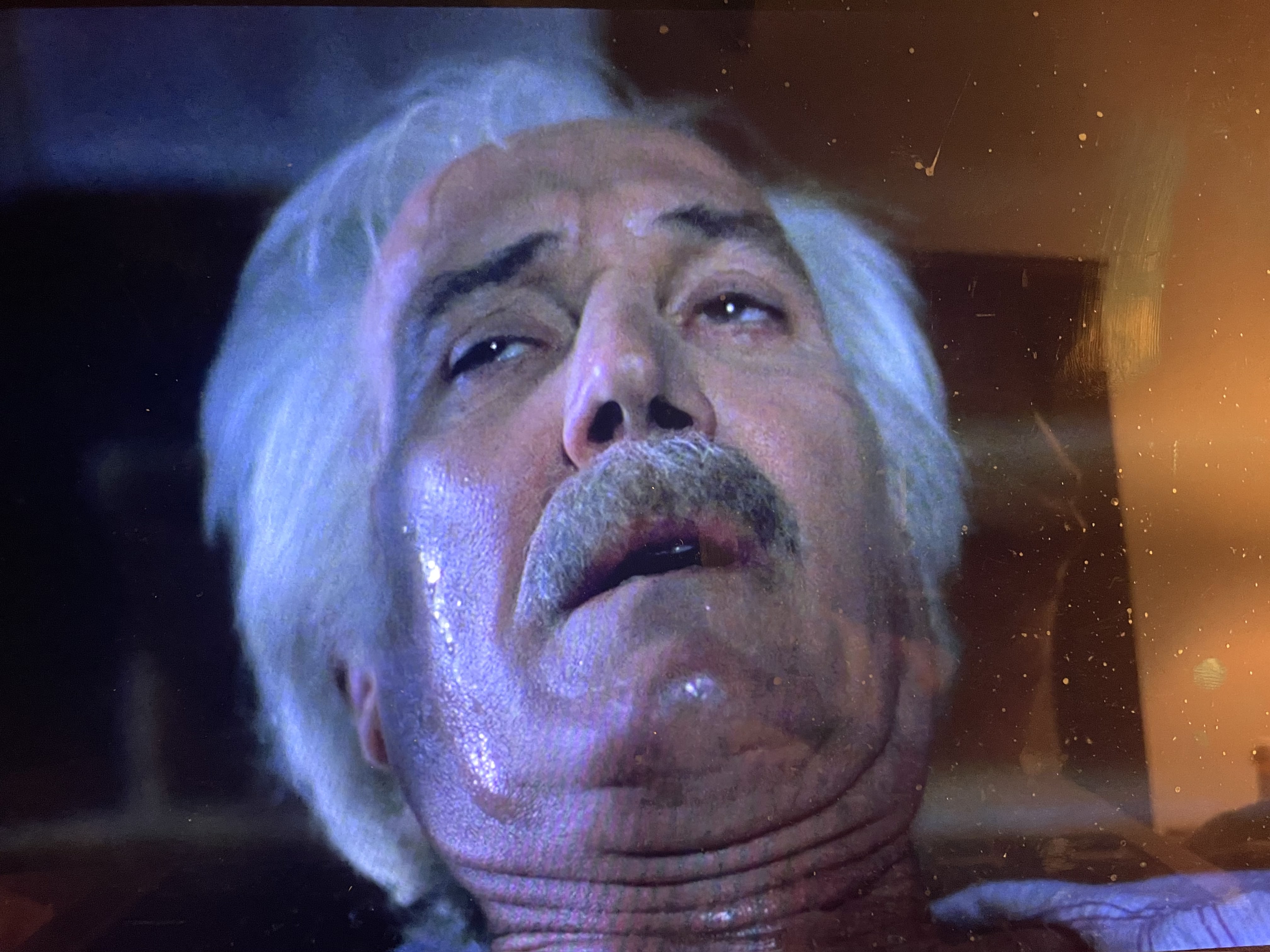 Close up still of Jesus sweating due to craving for blood