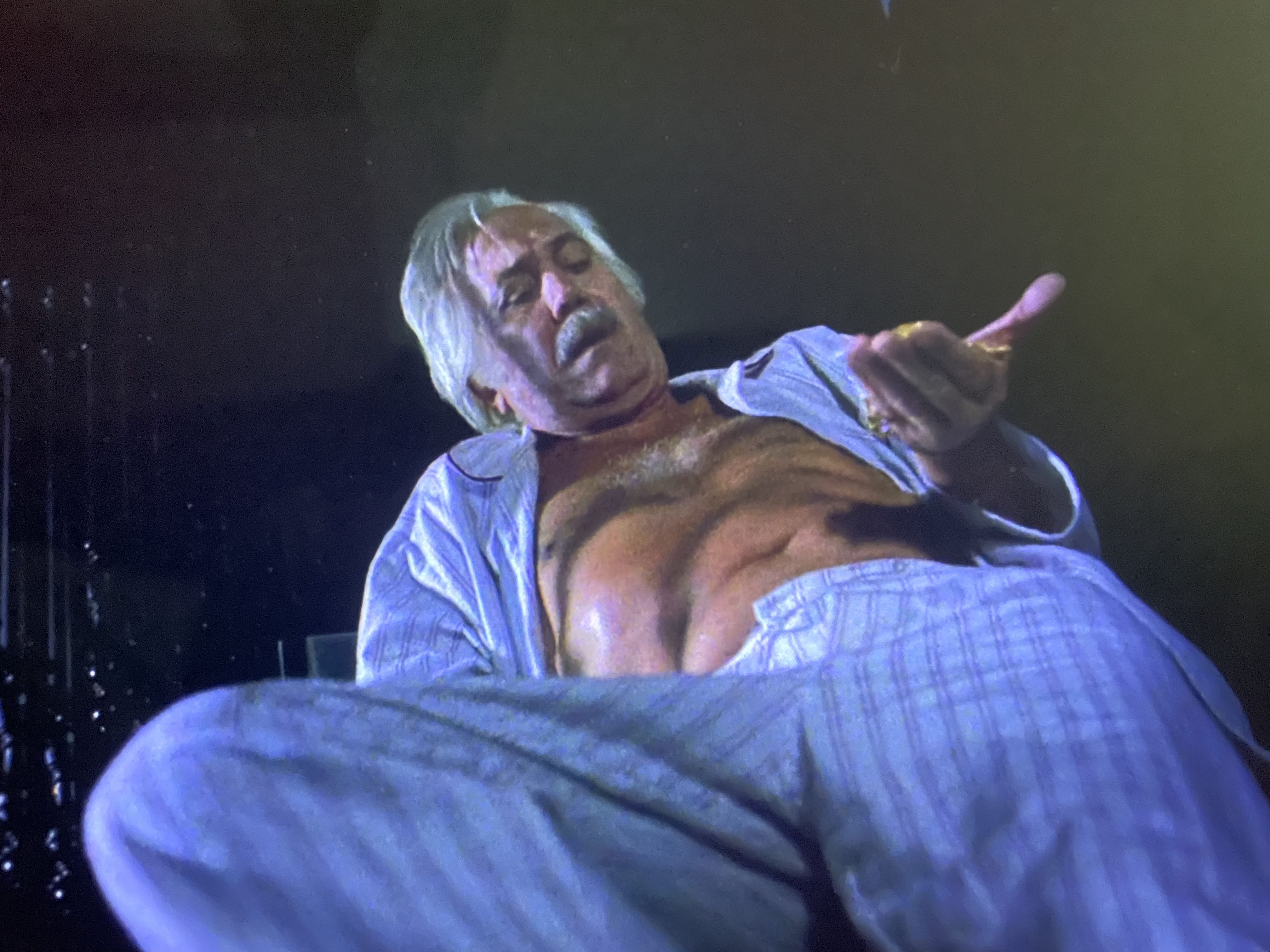 Canted angle shot of Jesus falling down stairs