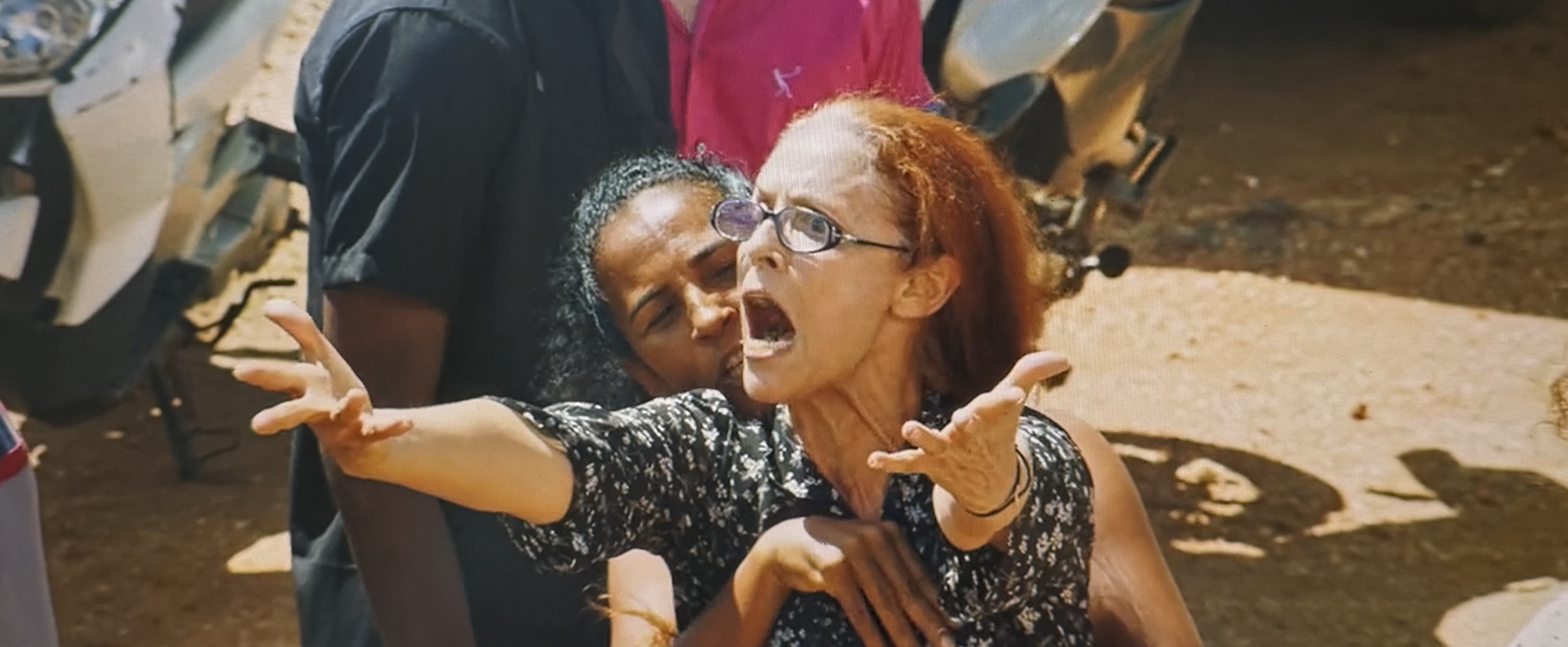 This still shows Dr. Domingas in her drunk state during her mourning. 
