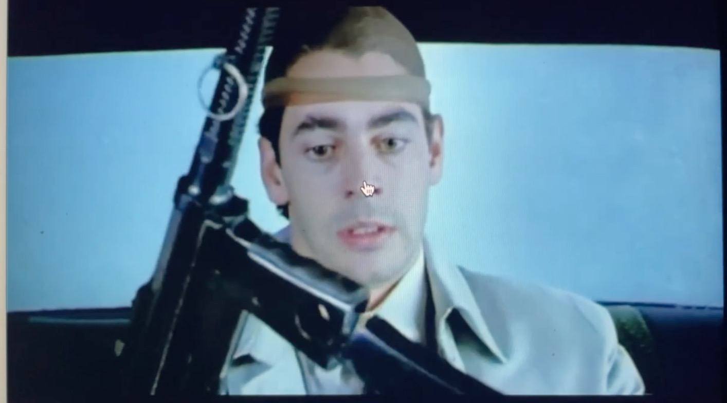 holding gun