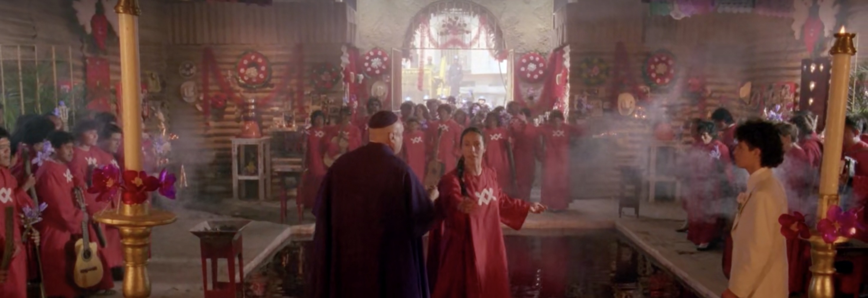 A church interior shot shows how Jodorowsky conceptualizes sacred space as a stage for rite, revealing the blurring of spectacle, religiosity, and fanaticism. These scenes were mostly filmed in the streets of Mexico City and real religious architecture in Mexico.