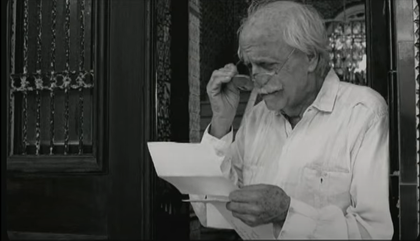 Father reading and crying at the rewritten letter of his daughter