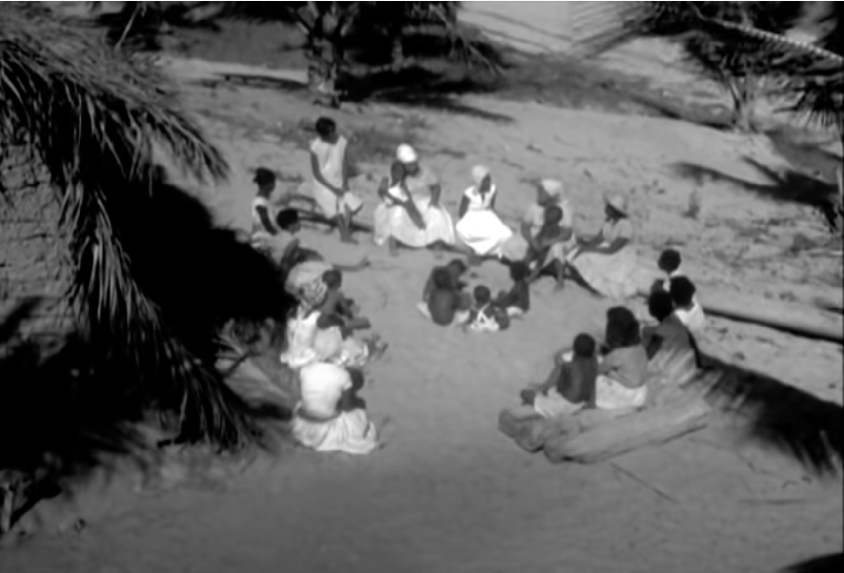 Women sitting in a circle.