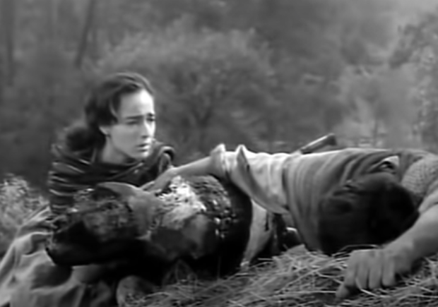 Macario's wife finds his dead body. He is slumped over a tree stub with his turkey.