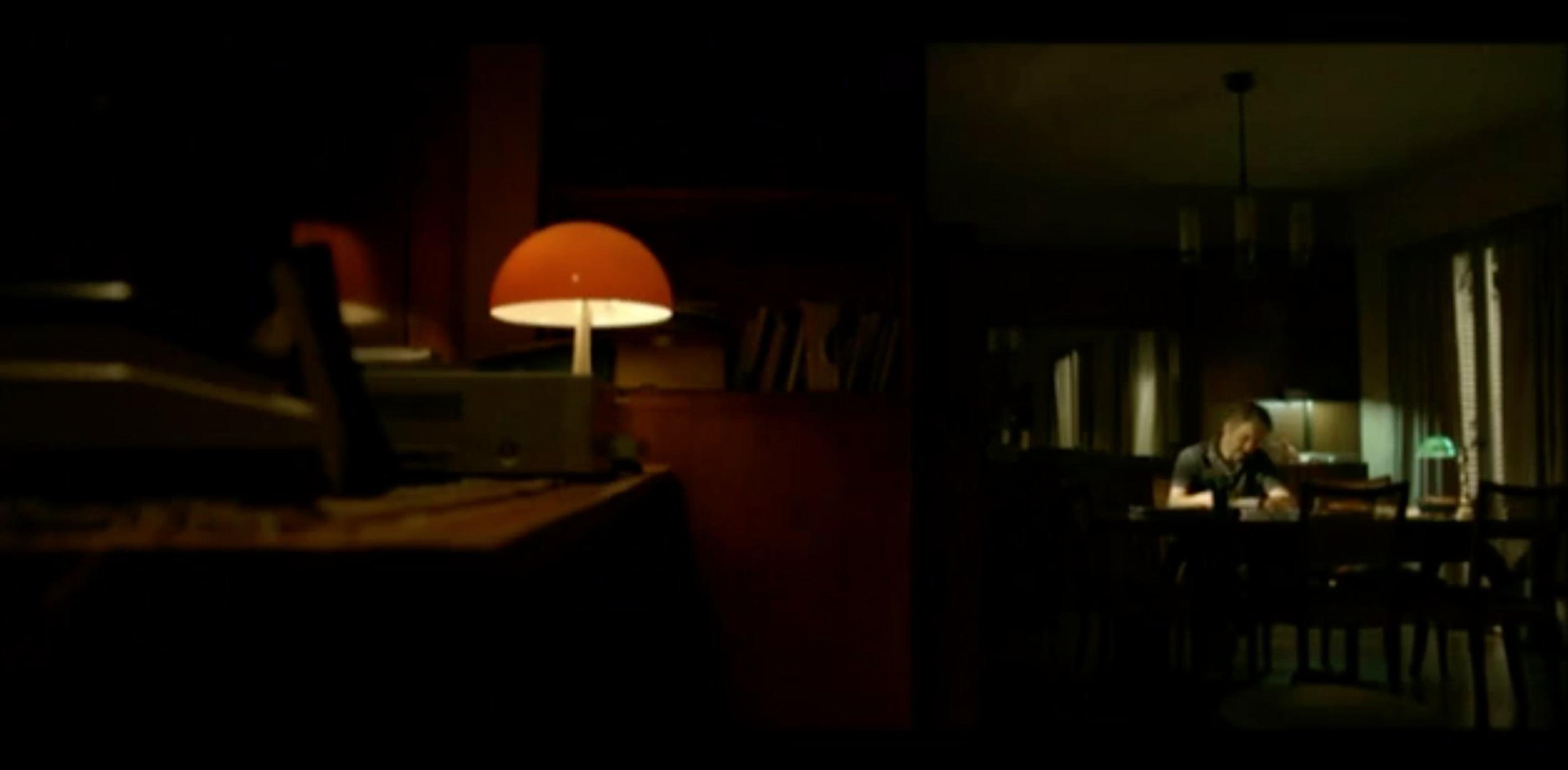 We see Espósito sitting the background of the shot working on his novel deep into the night.