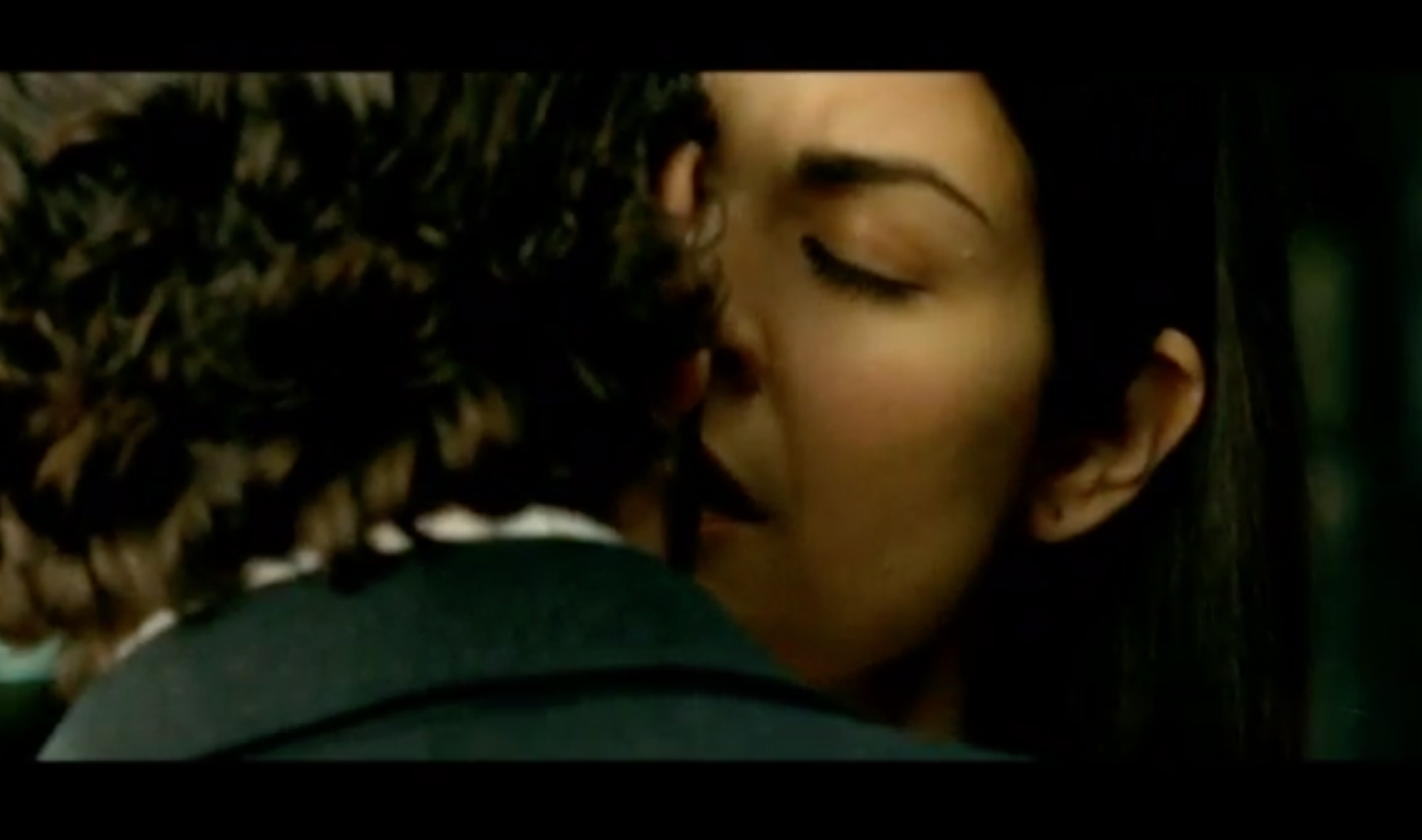 We see Irene and Espósito slowly withhold from kissing each other in a very intimate close-up shot.