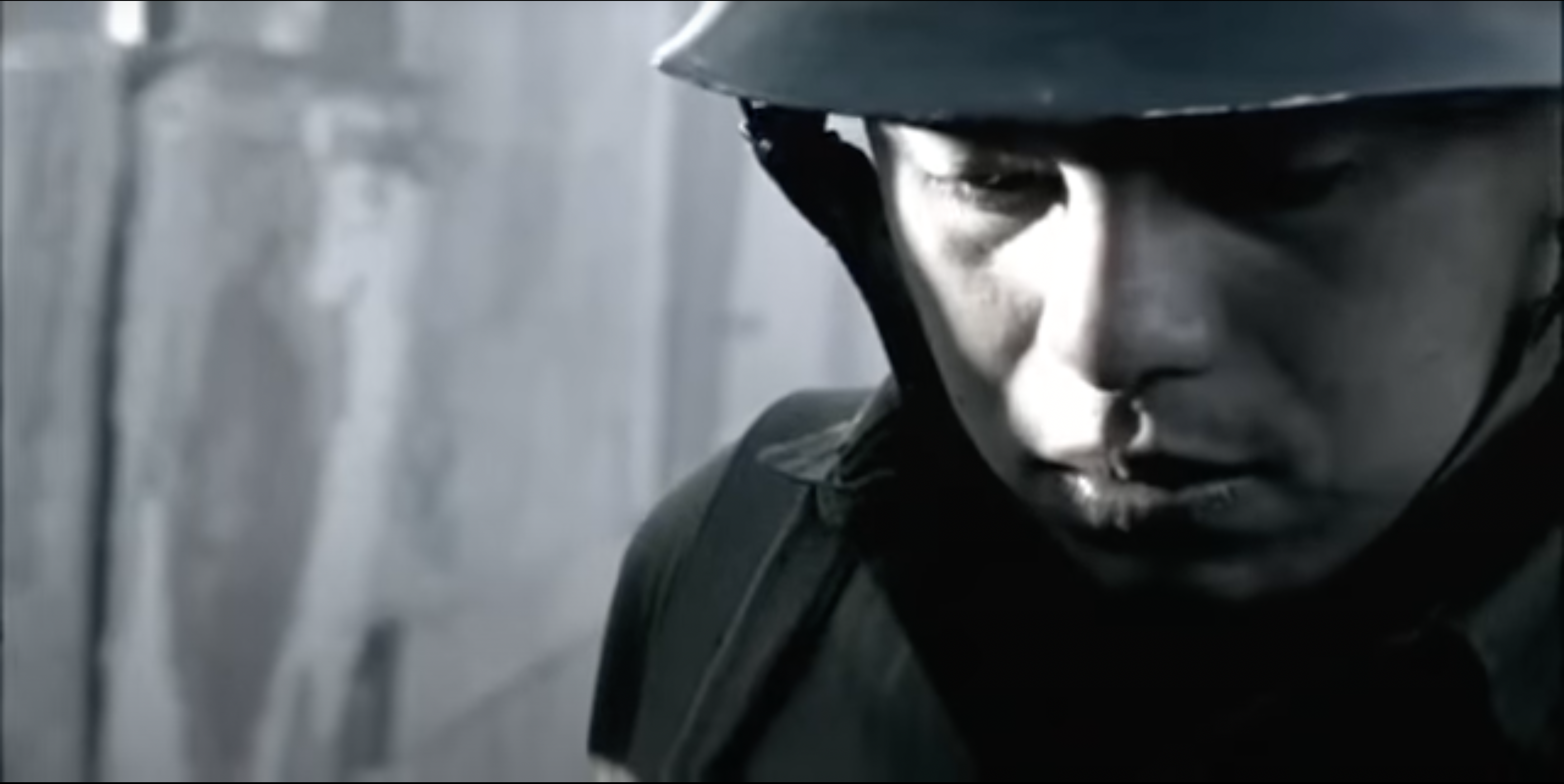 Soldier looking at Gonzalo's Adidas Shoes