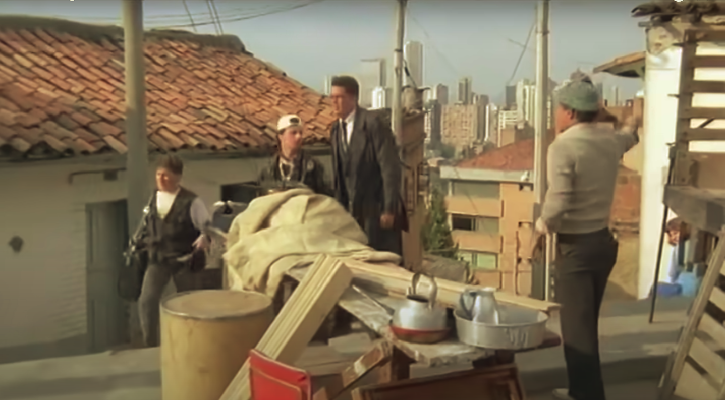 A medium distance shot of characters against the long distance background.