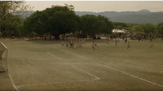 Deep focus keeps every layer sharp, emphasizing the realism of rural life and the importance of their environment.