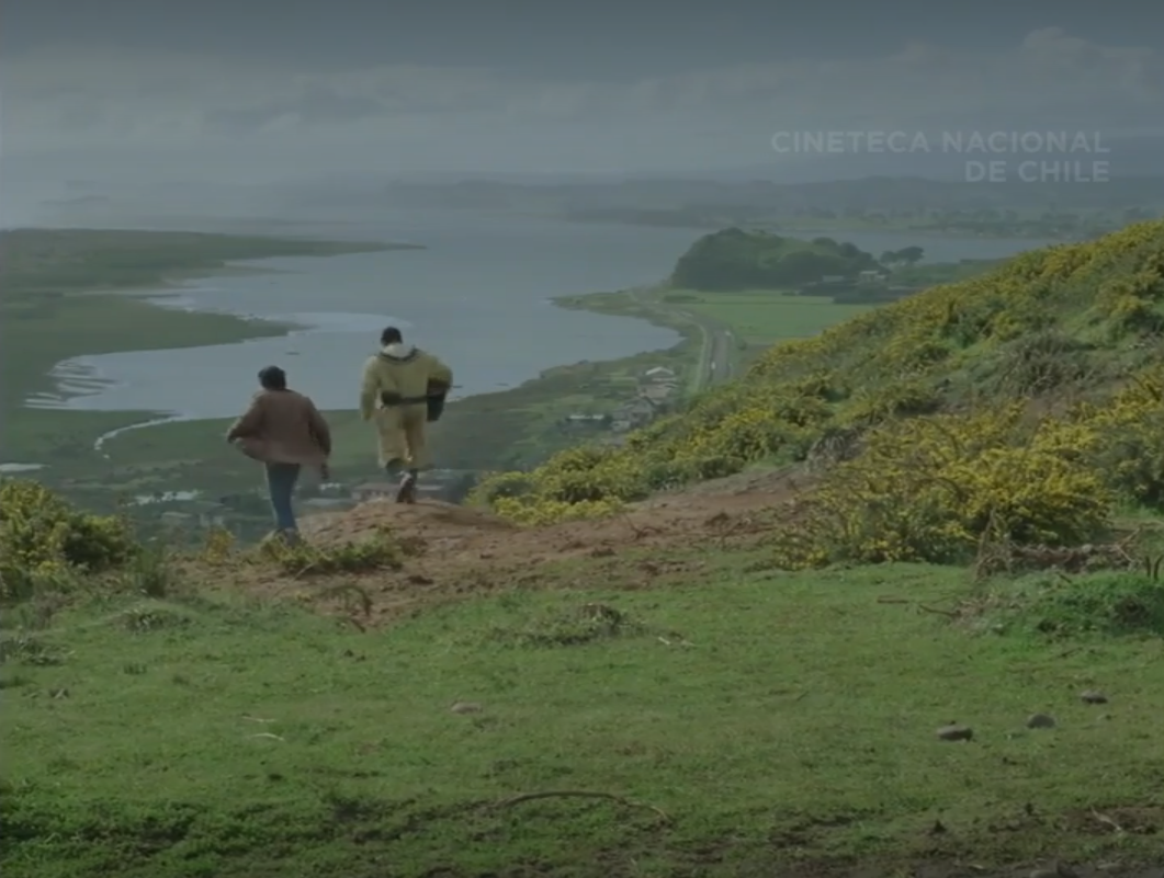 Ramiro walks with another character as the camera pans across the scenery