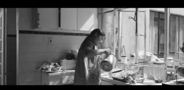 The movie is shot in black and white. This still simply shows that.