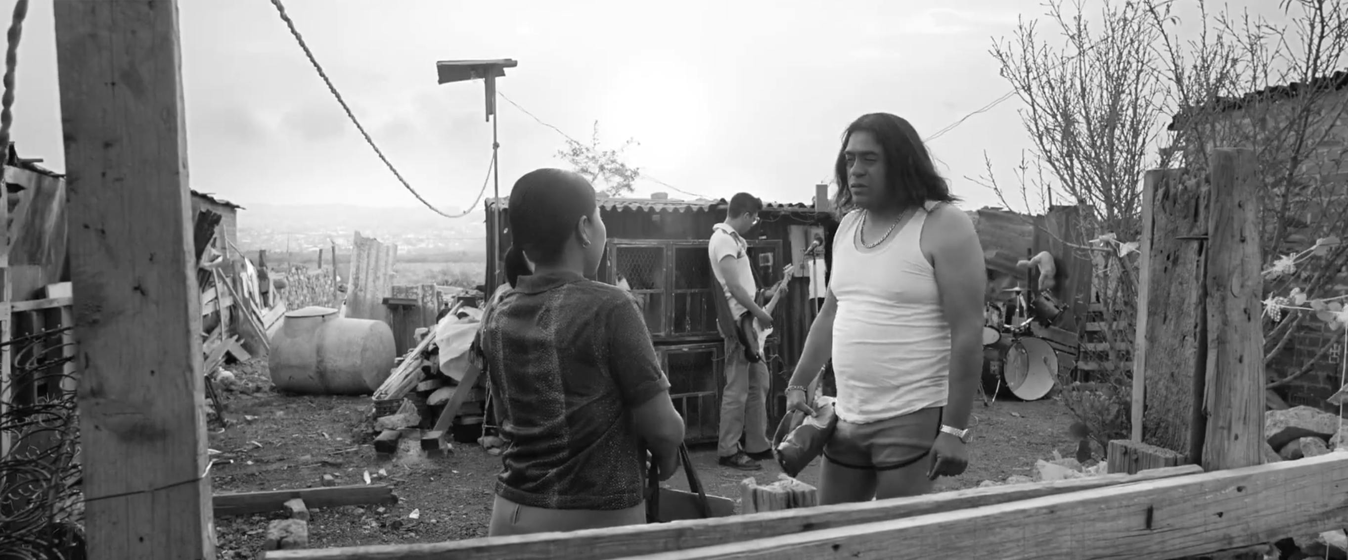 Cleo in a realistic looking junkyard.