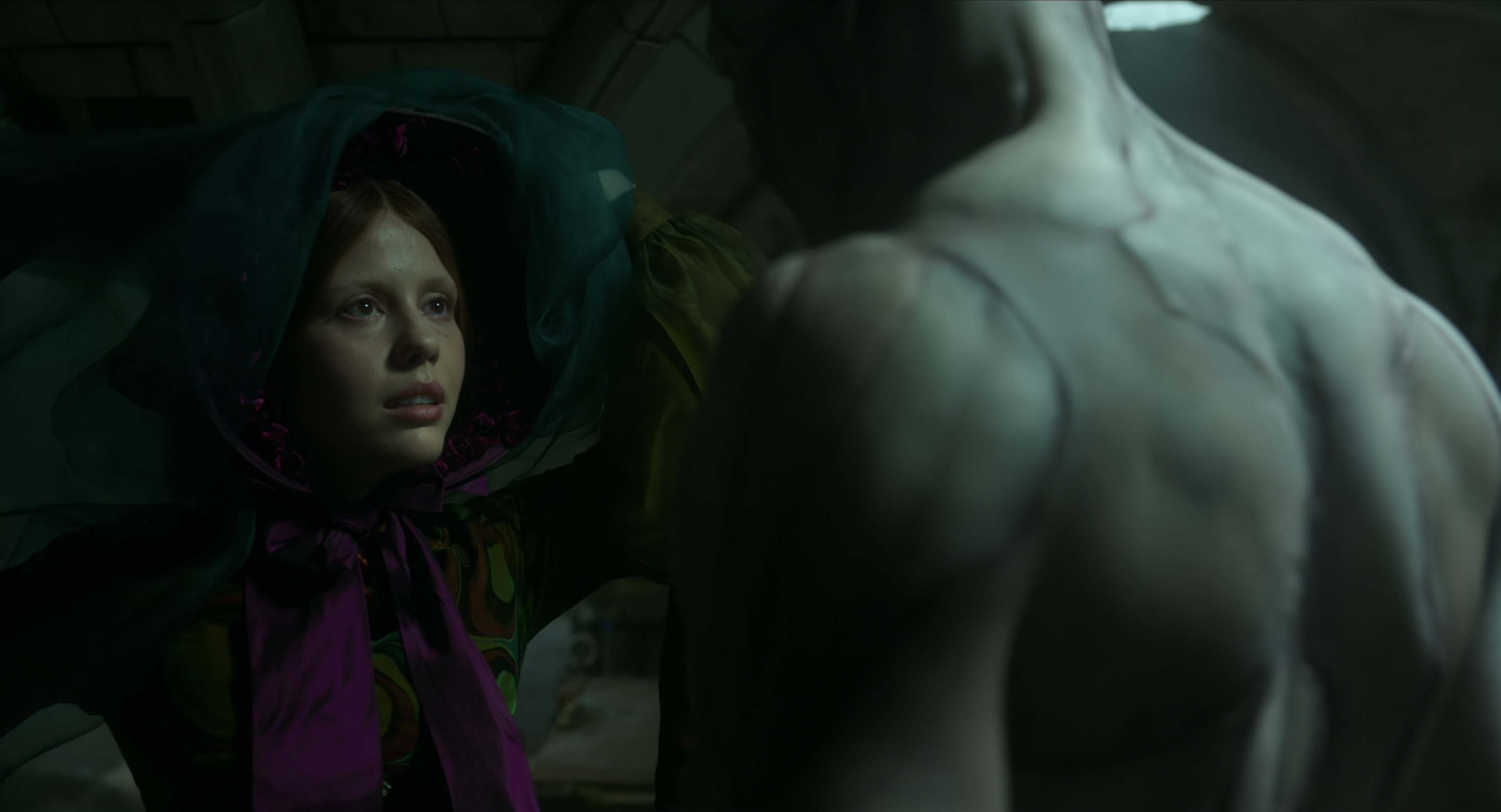 Elizabeth approaches the creature without fear tending and caring for it.