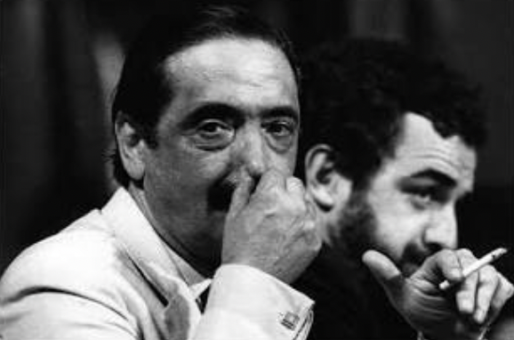 Julio Cesár Strassera in the 1985 trial gesturing towards the defense.