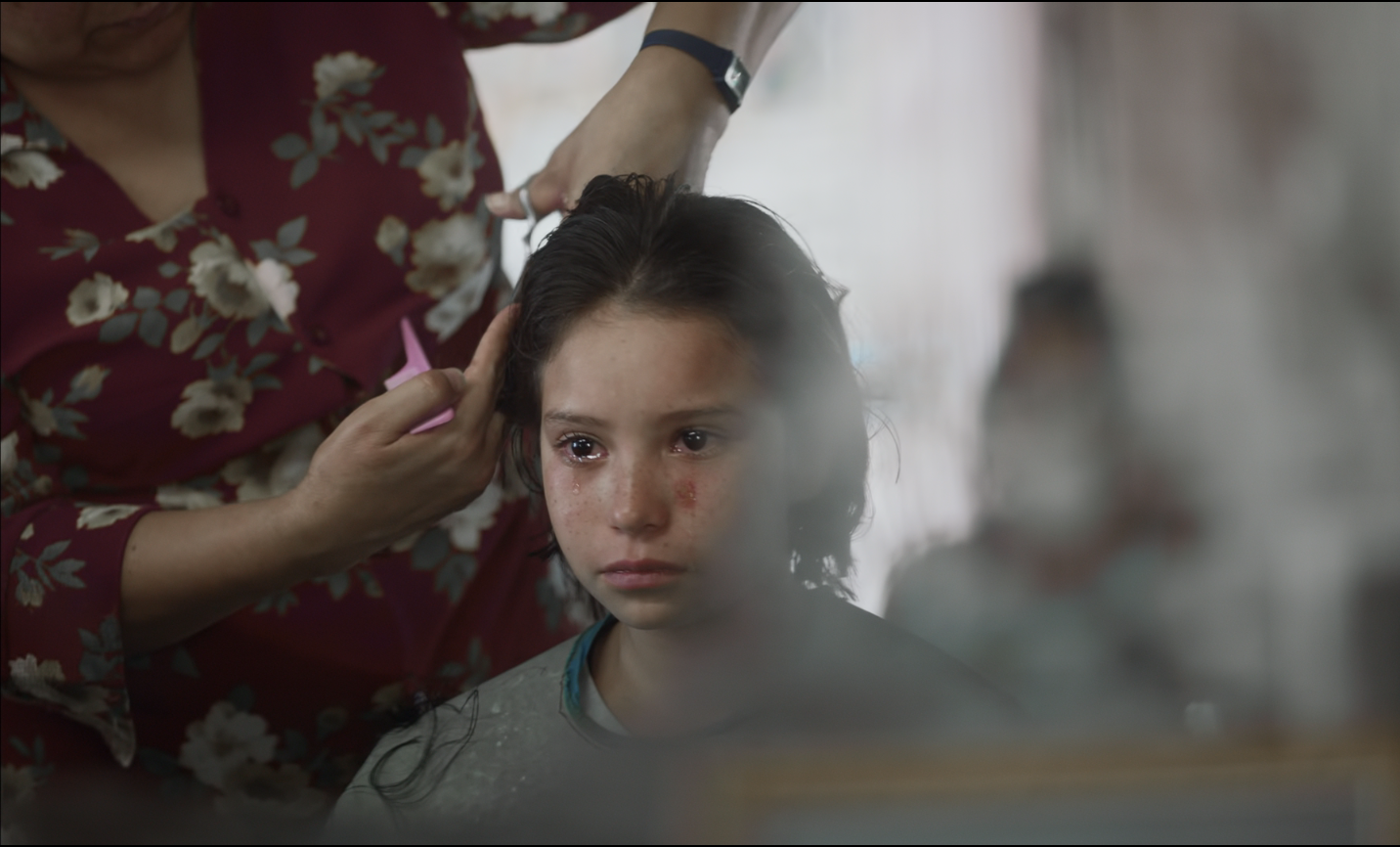 Ana getting her hair cut