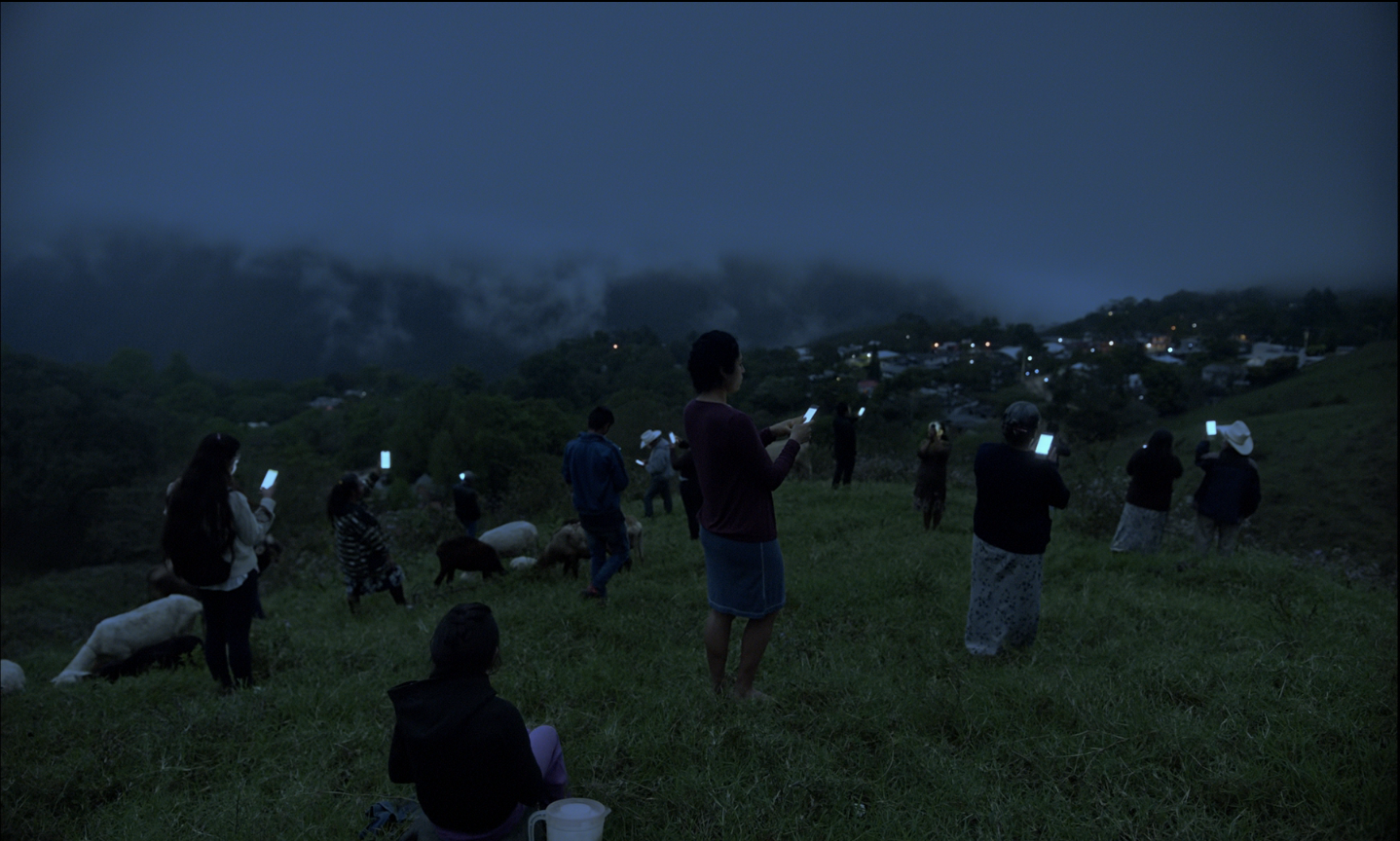 The villagers attempting to get phone signals