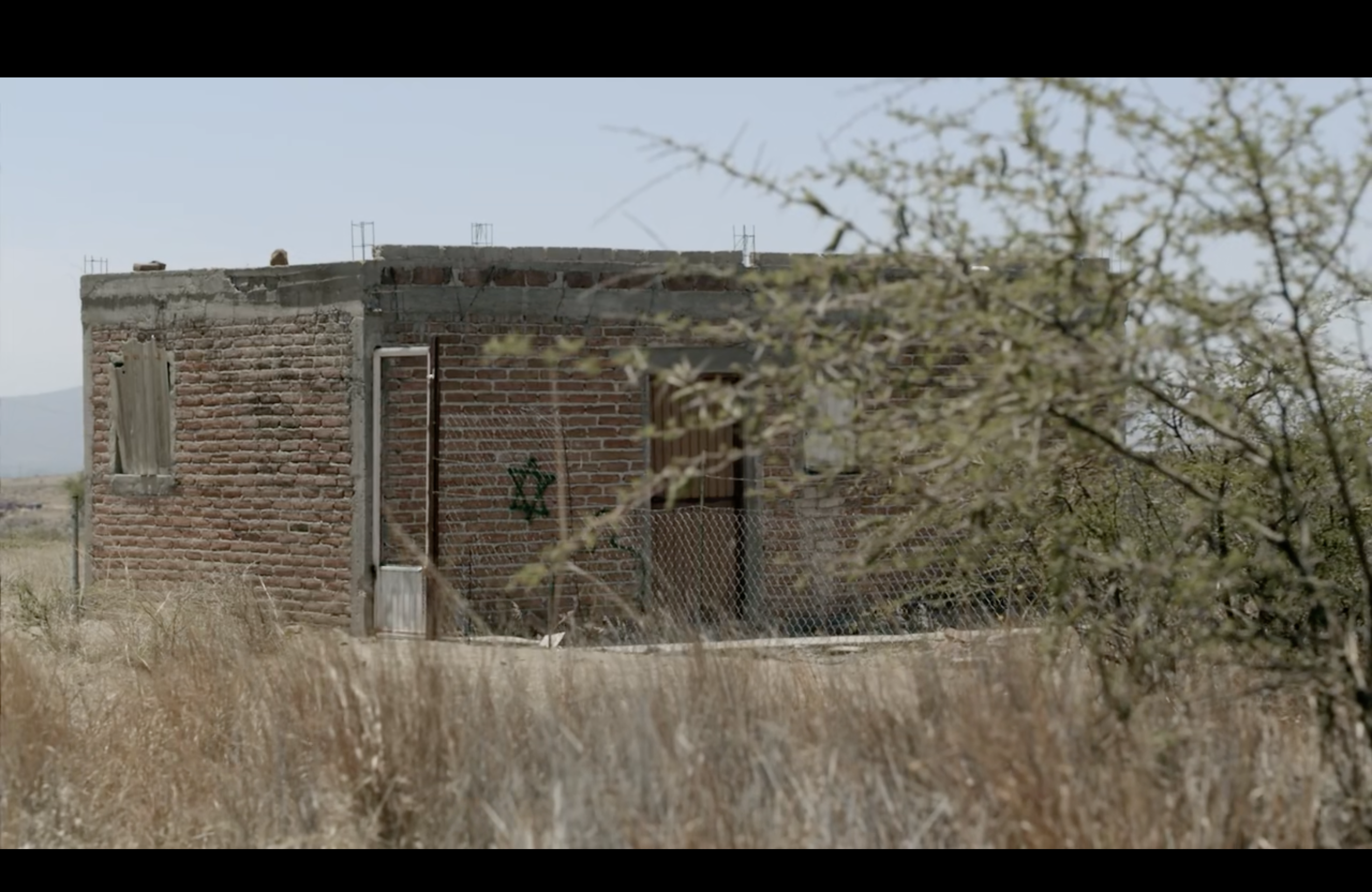 The building where Estela was raped and where Heli's map lead him to