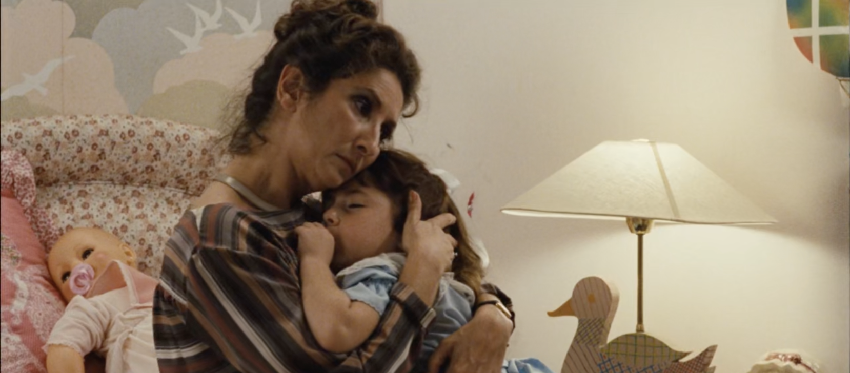 The doll reappears to represent Gaby's bought innocence and stolen childhood