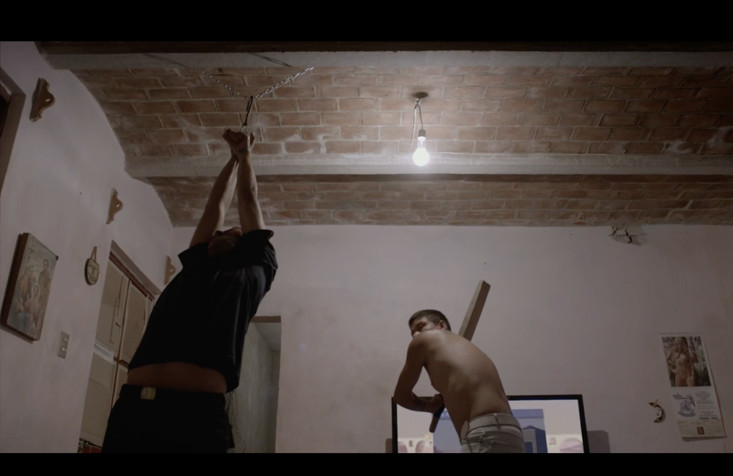 Beto being flogged.
