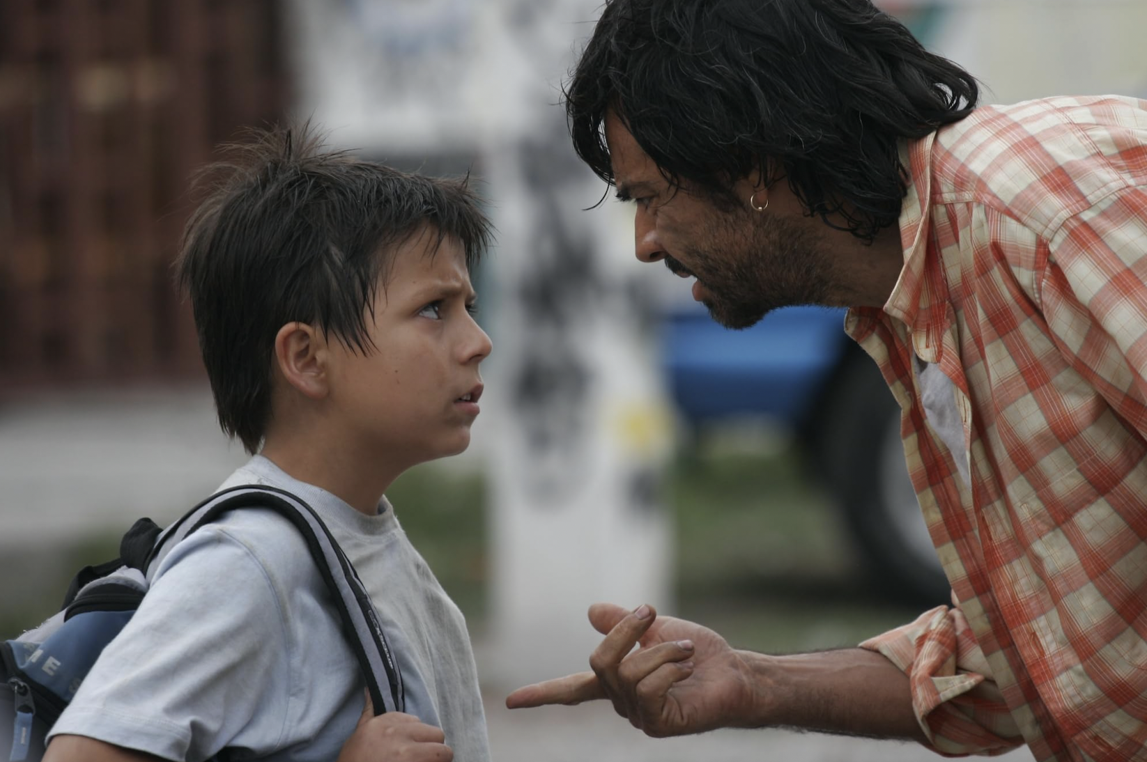 Enrique and Carlitos face-to-face
