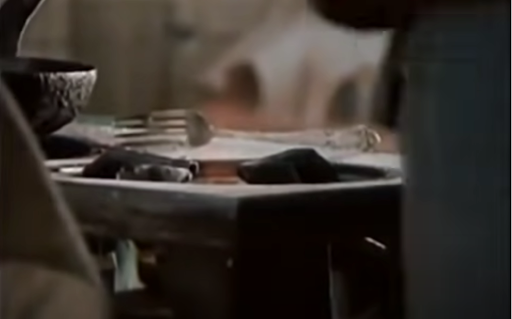 Fork on stove as Oscar and Lina's affair begins