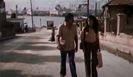 Oscar and Lina walk together.