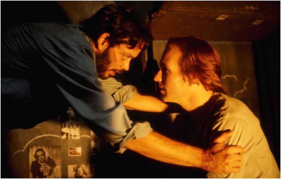 Warm lighting reflects the growing closeness between the inmates.